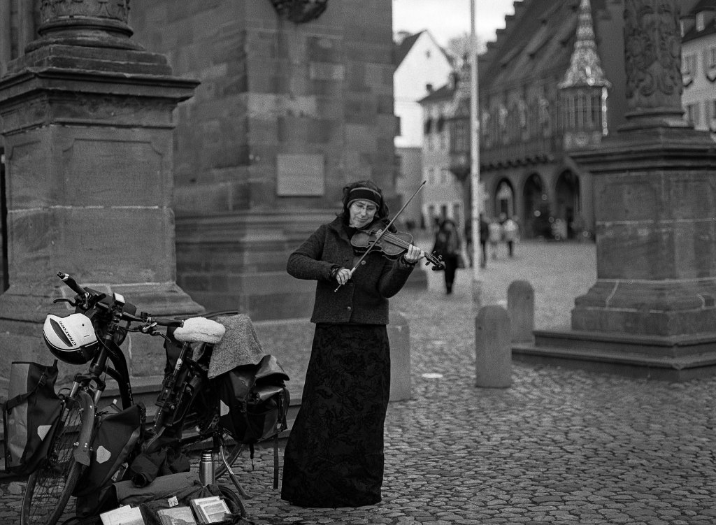amazing black and white street photo taken with cool vintage medium format camera