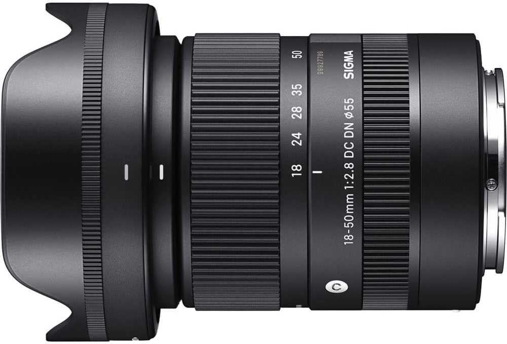 Sigma 18-50mm f/2.8 DC DN Contemporary lens from a side view, showcasing its compact design and zoom range.