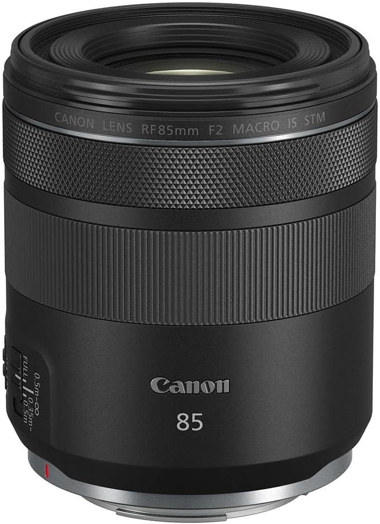 Canon RF 85mm f/2 Macro IS STM lens, featuring a sleek black design with textured grip, ideal for portrait photography.