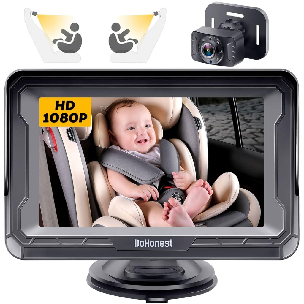 A car camera monitor displaying a smiling baby in a car seat, labeled HD 1080P, with the camera mounted on the vehicle's interior.
