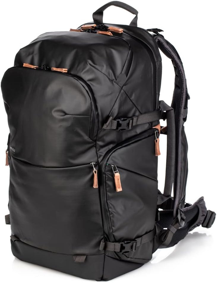 Black camera backpack with weatherproof zippers, ergonomic straps, and multiple access points for quick equipment retrieval.