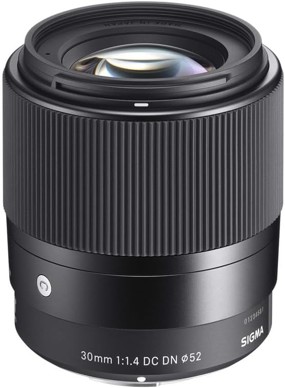 Sigma 30mm f/1.4 DC DN lens, featuring a sleek design with ribbed texture and markings indicating focal length and aperture, ideal for low-light photography and versatile shooting.