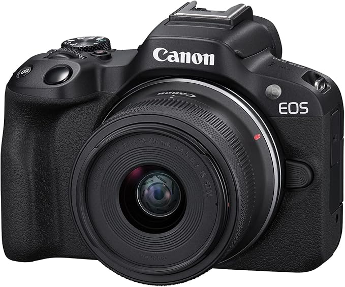 A Canon EOS R50 camera with a black body and lens, showcasing a sleek design suitable for photography enthusiasts.