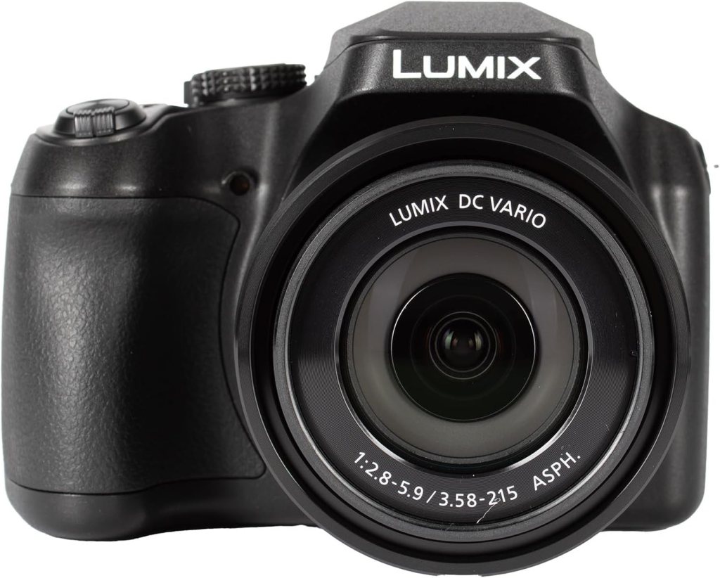A front view of a black Panasonic Lumix camera featuring a lens with specifications visible on the front.