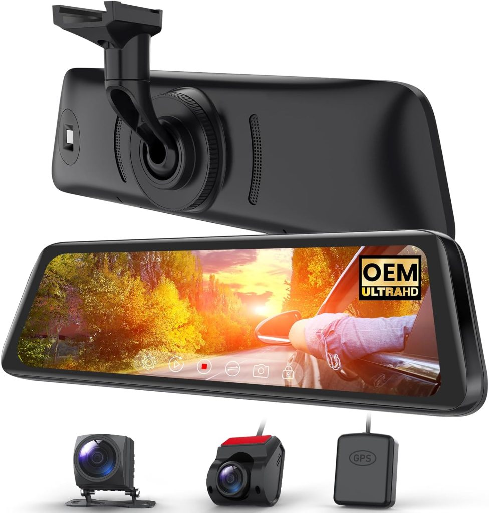 A black dashboard camera with an ultra-HD display showing a scenic road view, accompanied by two additional cameras and a GPS module.
