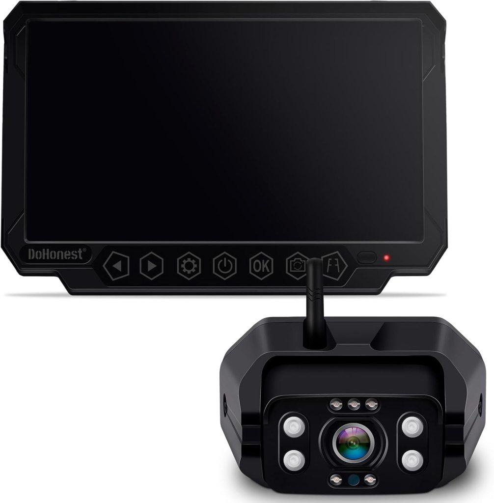 A black wireless camera and monitor system designed for vehicle safety, featuring a monitor with buttons and a camera equipped with LED lights.