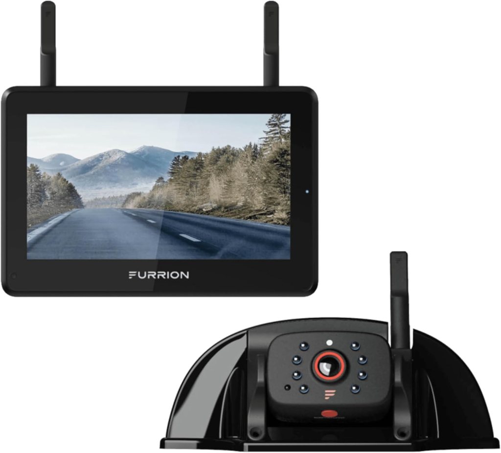 Furrion wireless monitor and camera system featuring a display screen showing a mountain road scene.