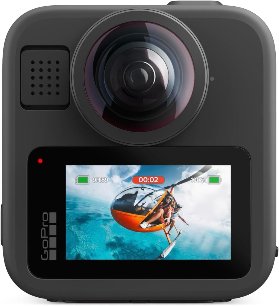 Front view of a GoPro camera with a large lens and display showing recording helicoper footage over a blue ocean.