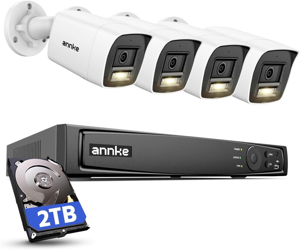 Four white outdoor security cameras with built-in lights and a black recording device, featuring a 2TB hard drive.