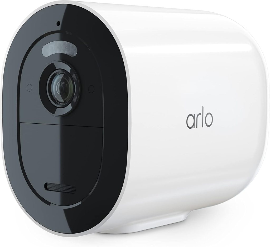 A modern Arlo security camera in white and black design, featuring a lens and motion sensor.