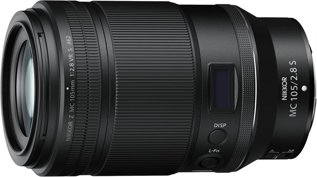 Nikkor Z MC 105mm f/2.8 VR S camera lens with a sleek black design, featuring focus and display controls.