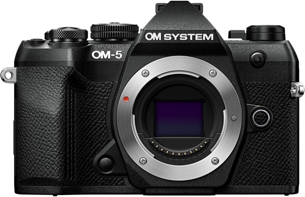 Front view of the OM System OM-5 camera, featuring a sleek black design and visible lens mount.
