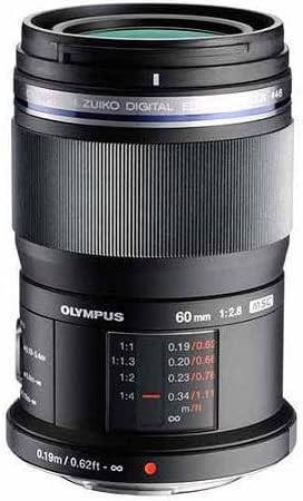 Olympus Zuiko Digital 60mm f/2.8 macro camera lens, displaying focus distance markings and an engraved barrel design.