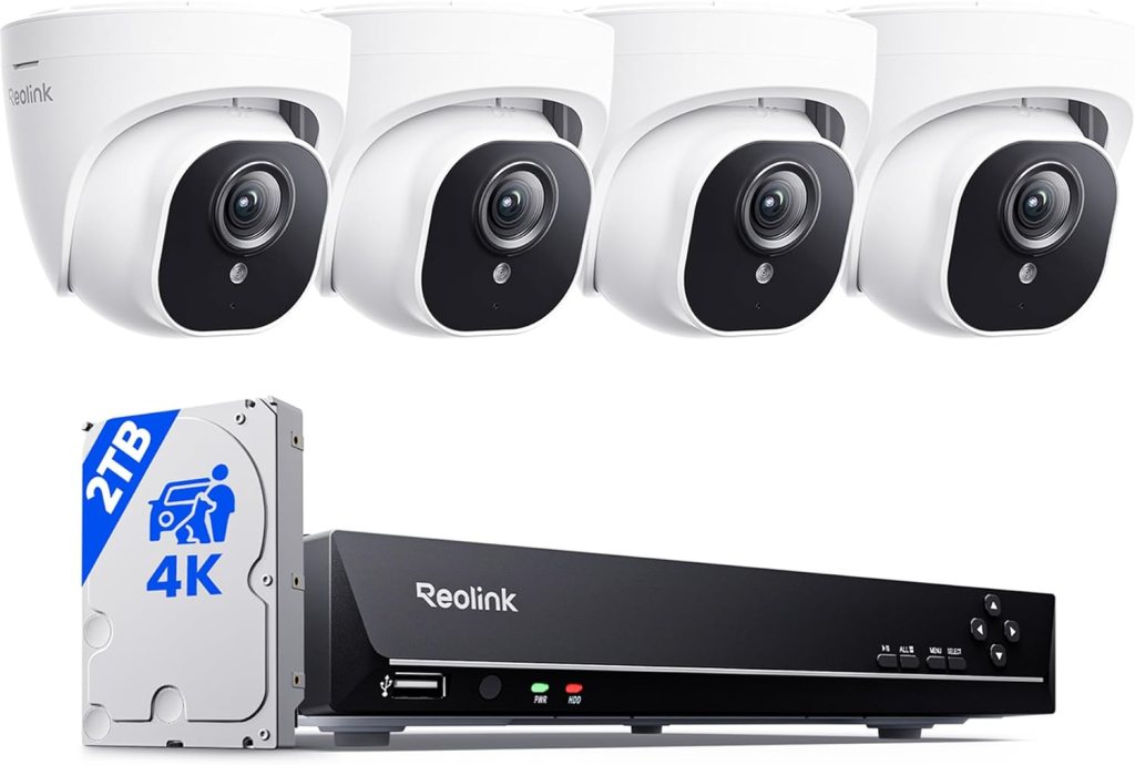 Four Reolink security cameras positioned above a black recording device, with a label indicating a 2TB 4K hard drive.