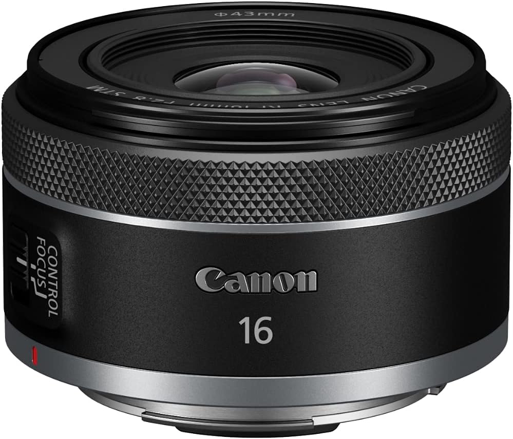 Close-up of a Canon 16mm lens with a black exterior and silver detailing.