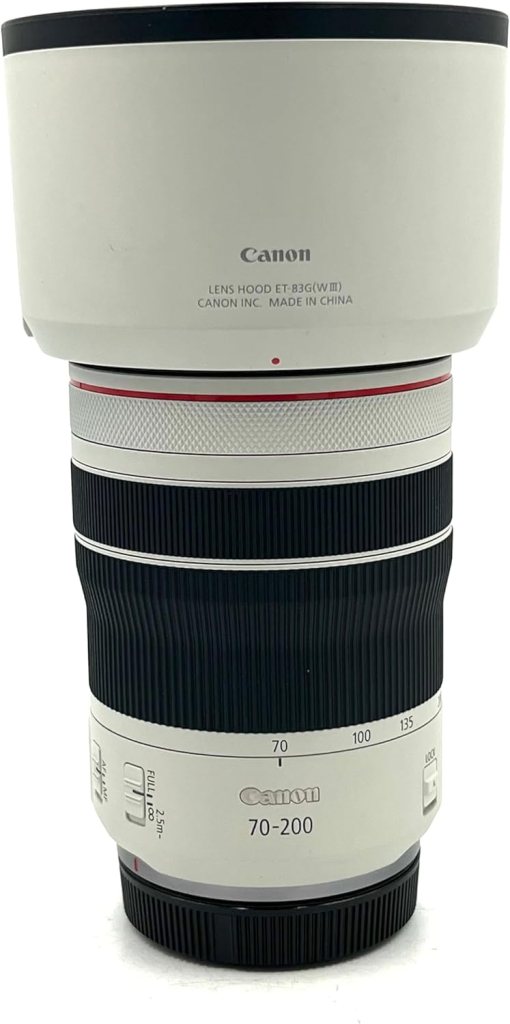 Canon 70-200mm camera lens with a white lens hood, featuring zoom and focus markings.