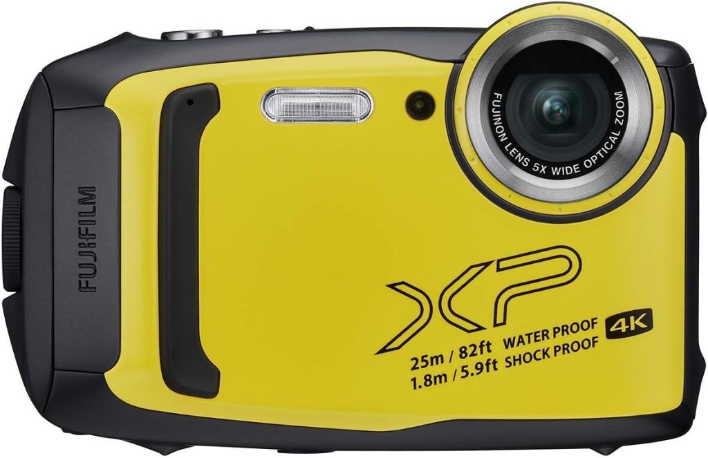 A yellow Fujifilm XP camera featuring a wide optical zoom lens, labelled as waterproof up to 25 metres and shockproof.