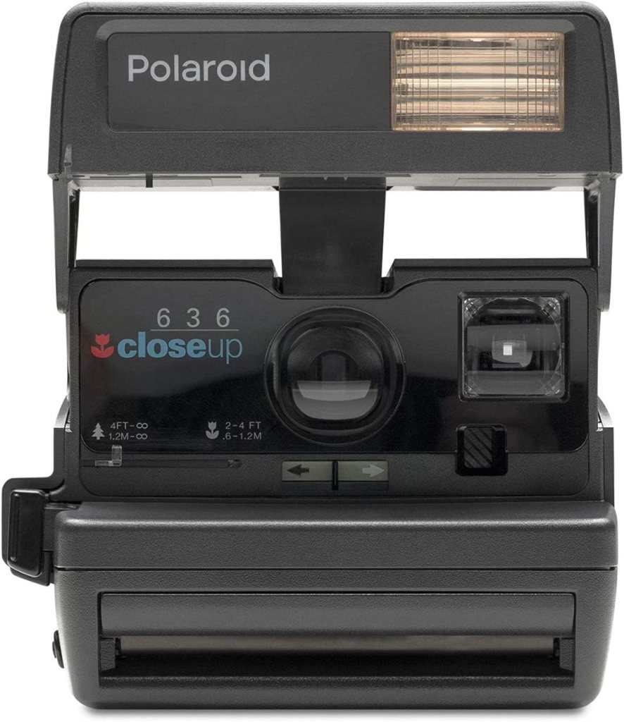 Front view of a Polaroid 636 Closeup instant camera with a flash and lens.