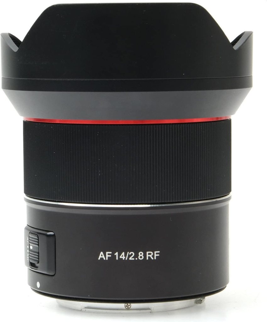 A black camera lens with a red accent and petal-shaped lens hood, labelled AF 14/2.8 RF.