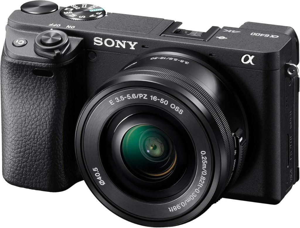 A Sony Alpha camera model C6400, featuring a compact design, a textured grip, and a lens with a focal range of 16-50mm.