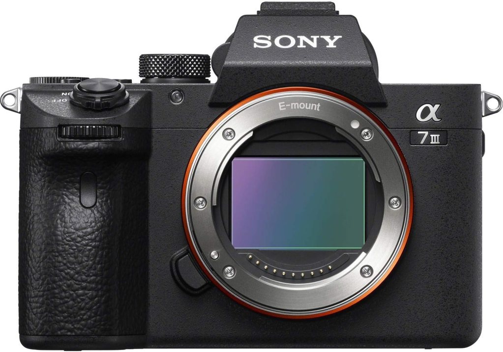 Front view of a Sony Alpha 7 III camera, featuring an E-mount and a visible sensor area.